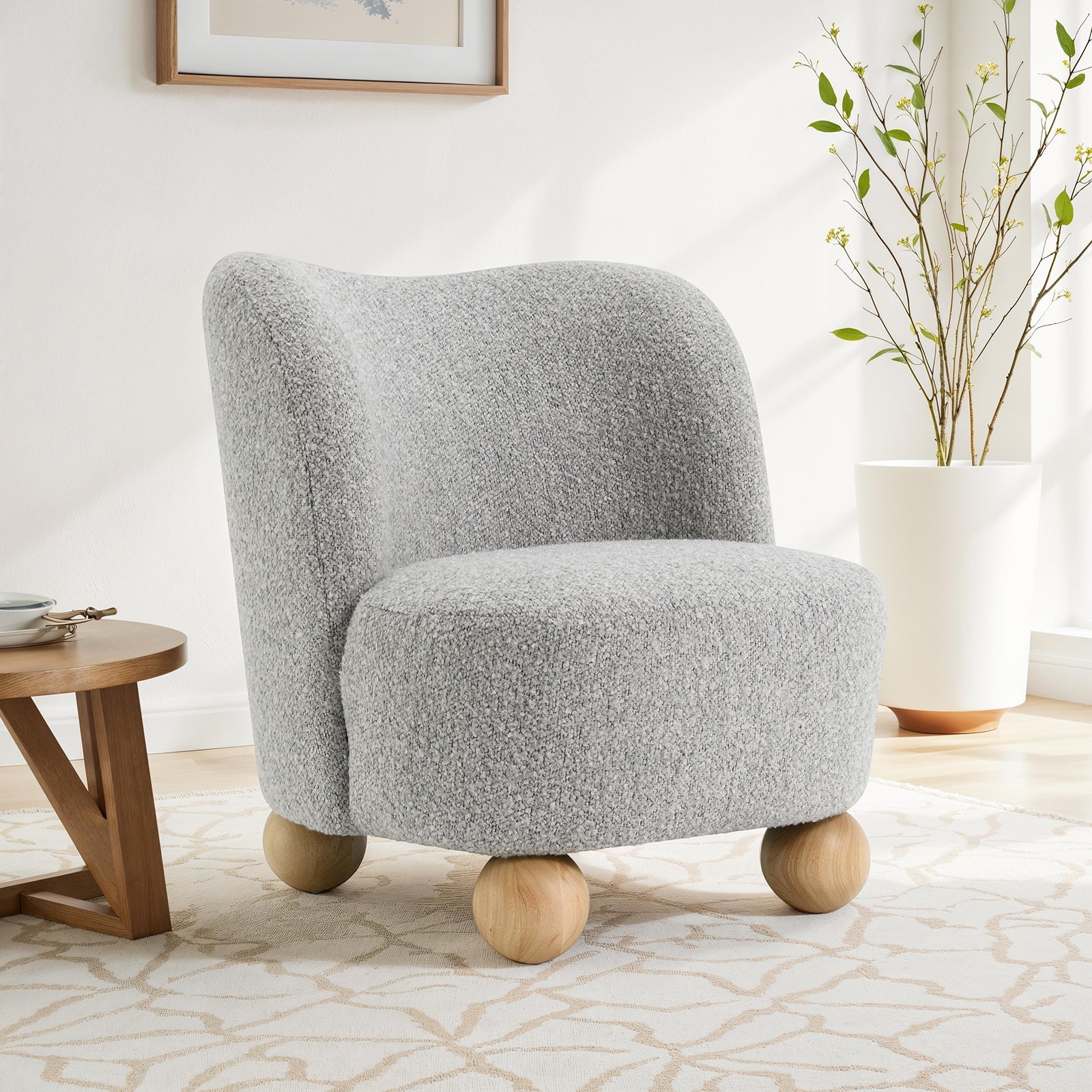 Fauteuil d'appoint incurvé en boucle avec pieds boule