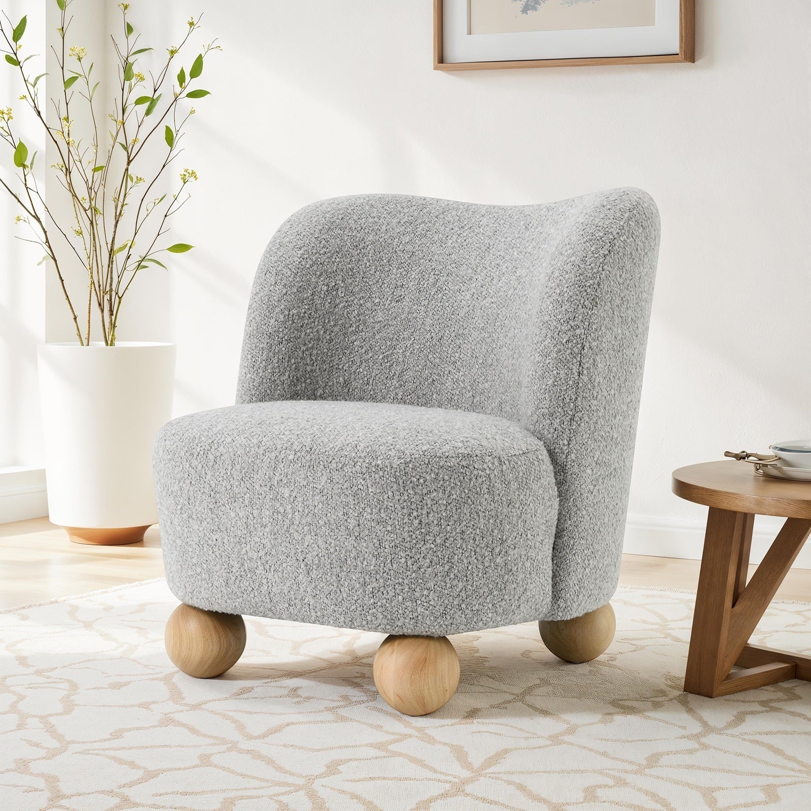 Fauteuil d'appoint incurvé en boucle avec pieds boule