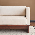 Canapé bouclé style années 50 avec piètement en bois massif 