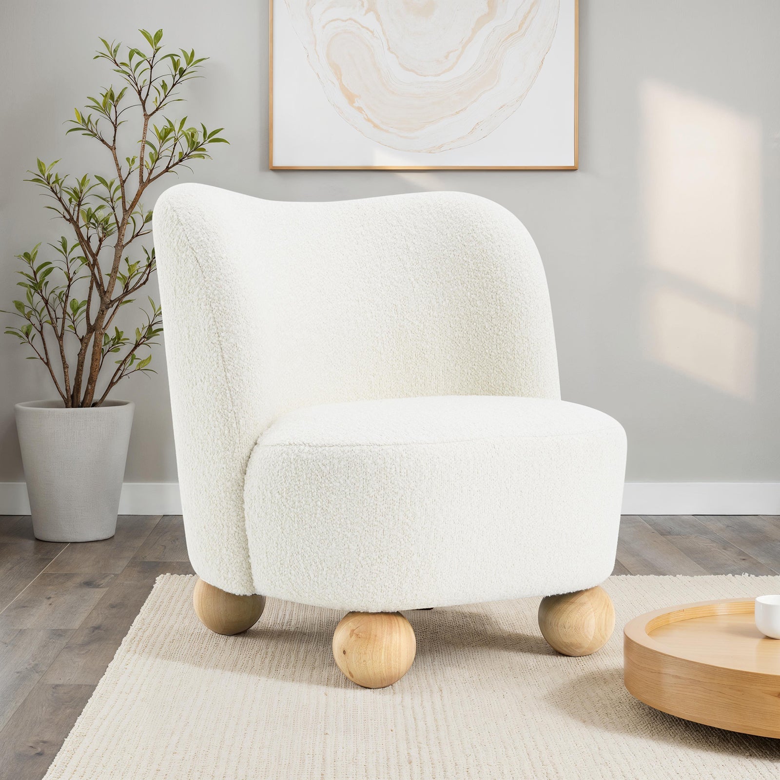 Fauteuil d'appoint incurvé en boucle avec pieds boule
